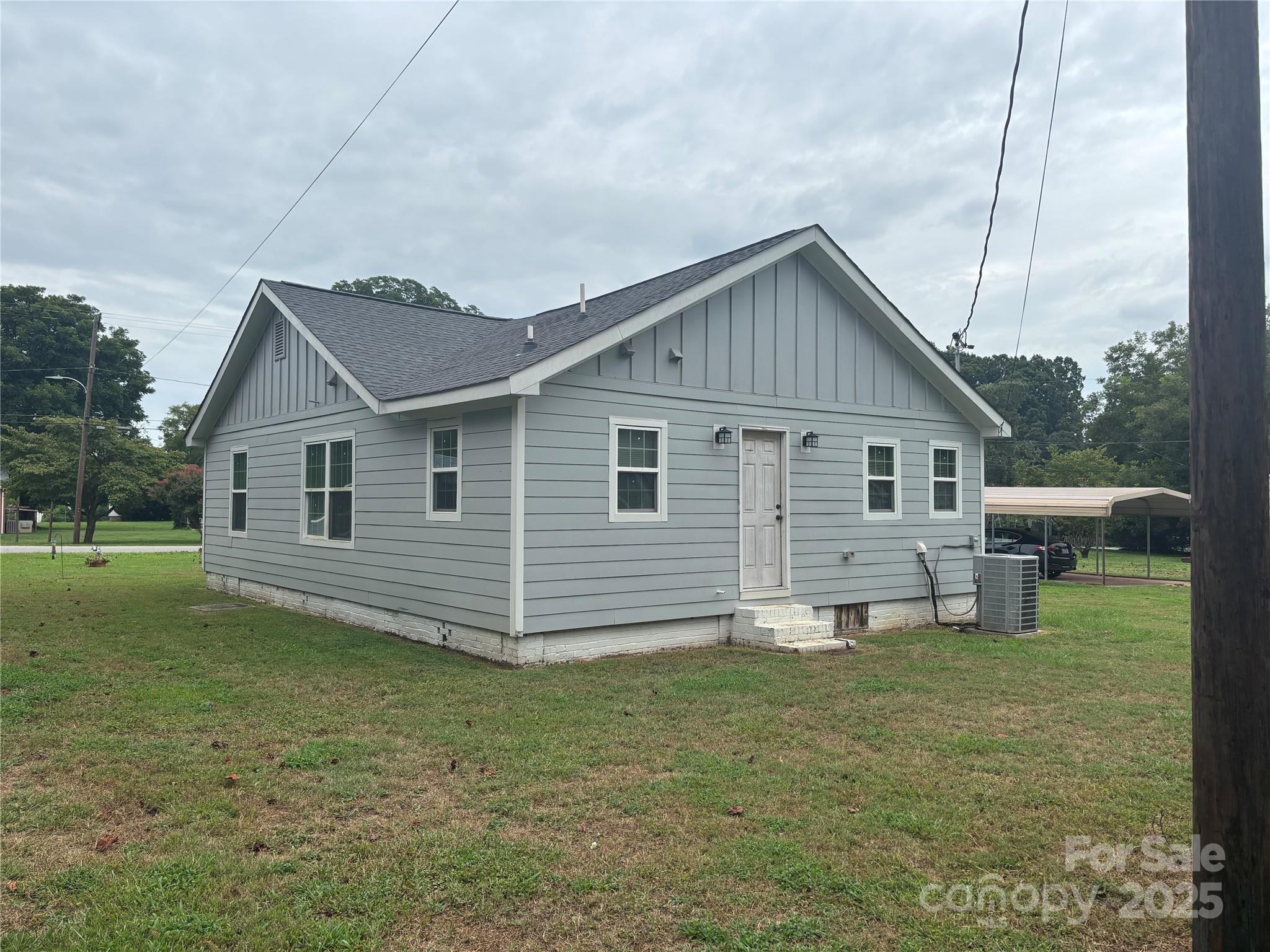 231 Browntown Road Belmont, NC 28012 - Photo 12 of 12 a front view of a house with garden
