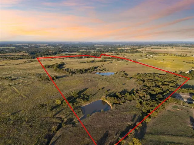 an aerial view of beach and ocean