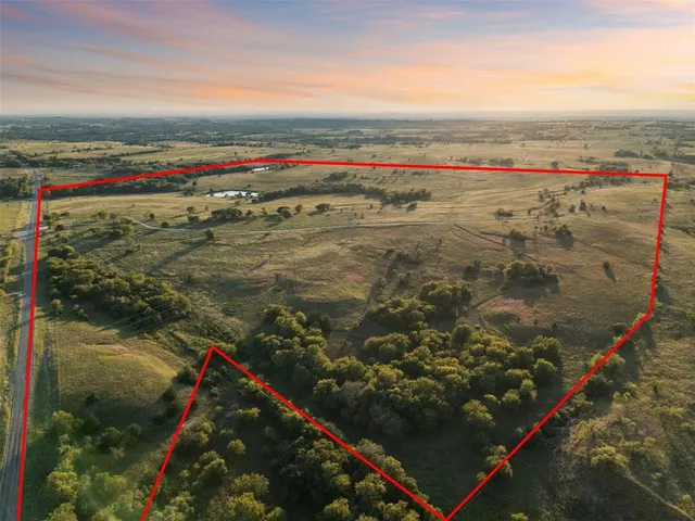 an aerial view of beach and ocean view