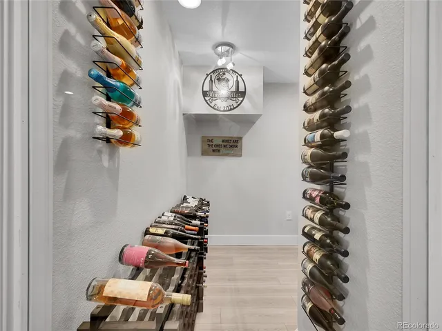 a bedroom with a large bed and a large window