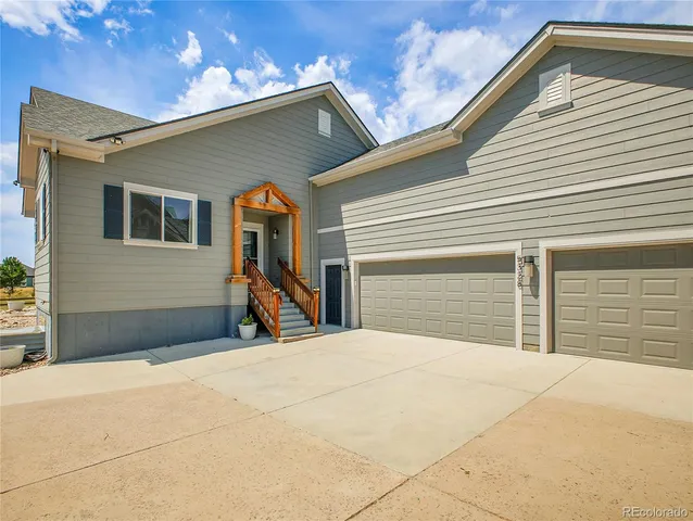 a view of a house with a garage
