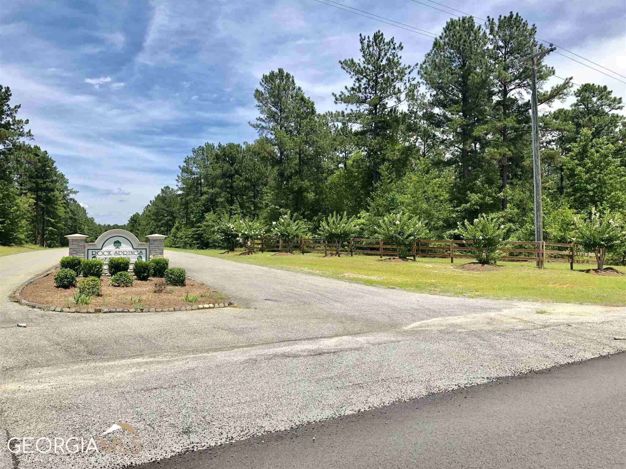 0 Grey Wolf Trail, Unit LOT 151 Dublin, GA 31021 - Photo 5 of 6 a view of a swimming pool and a yard