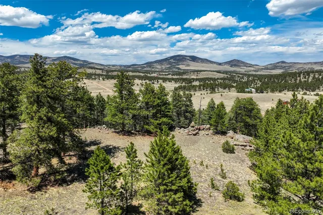 a view of a lake with a mountain