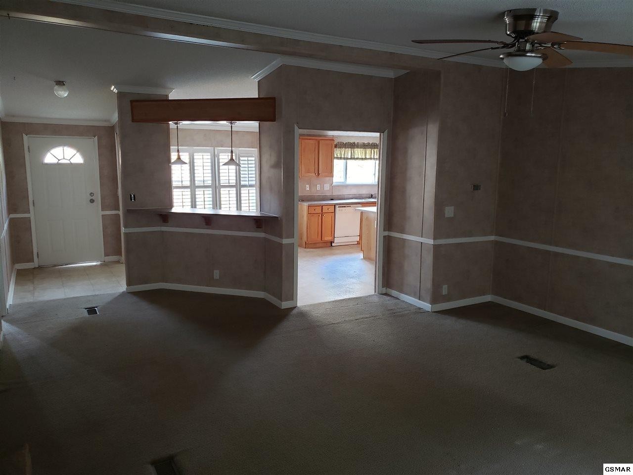 1033 Beard Valley Road Maynardville, TN 37807 - Photo 7 of 22 an empty room with windows and entrance
