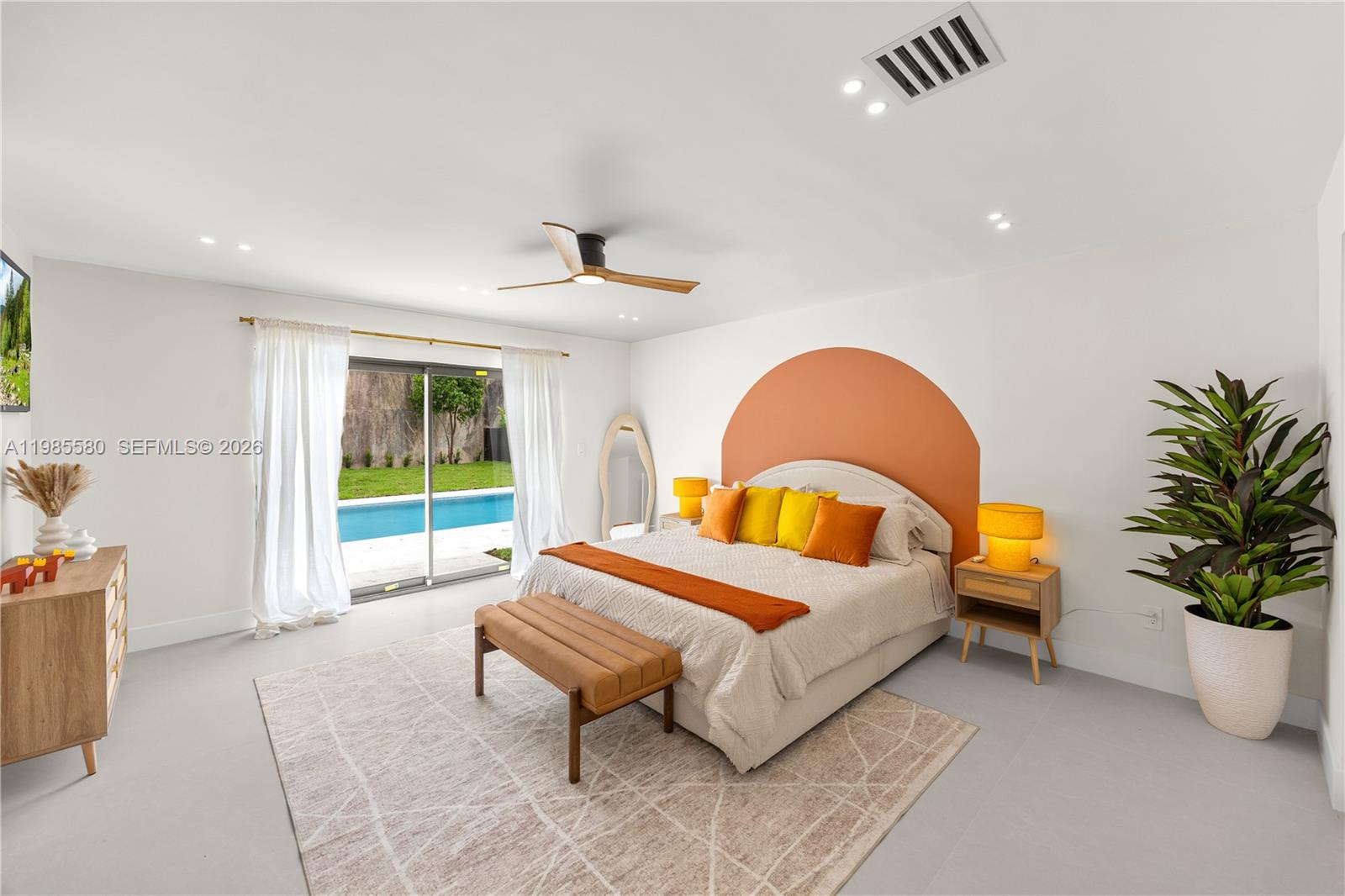 9261 Southwest 80th Terrace Miami, FL 33173 - Photo 23 of 58 a bedroom with a bed and a window