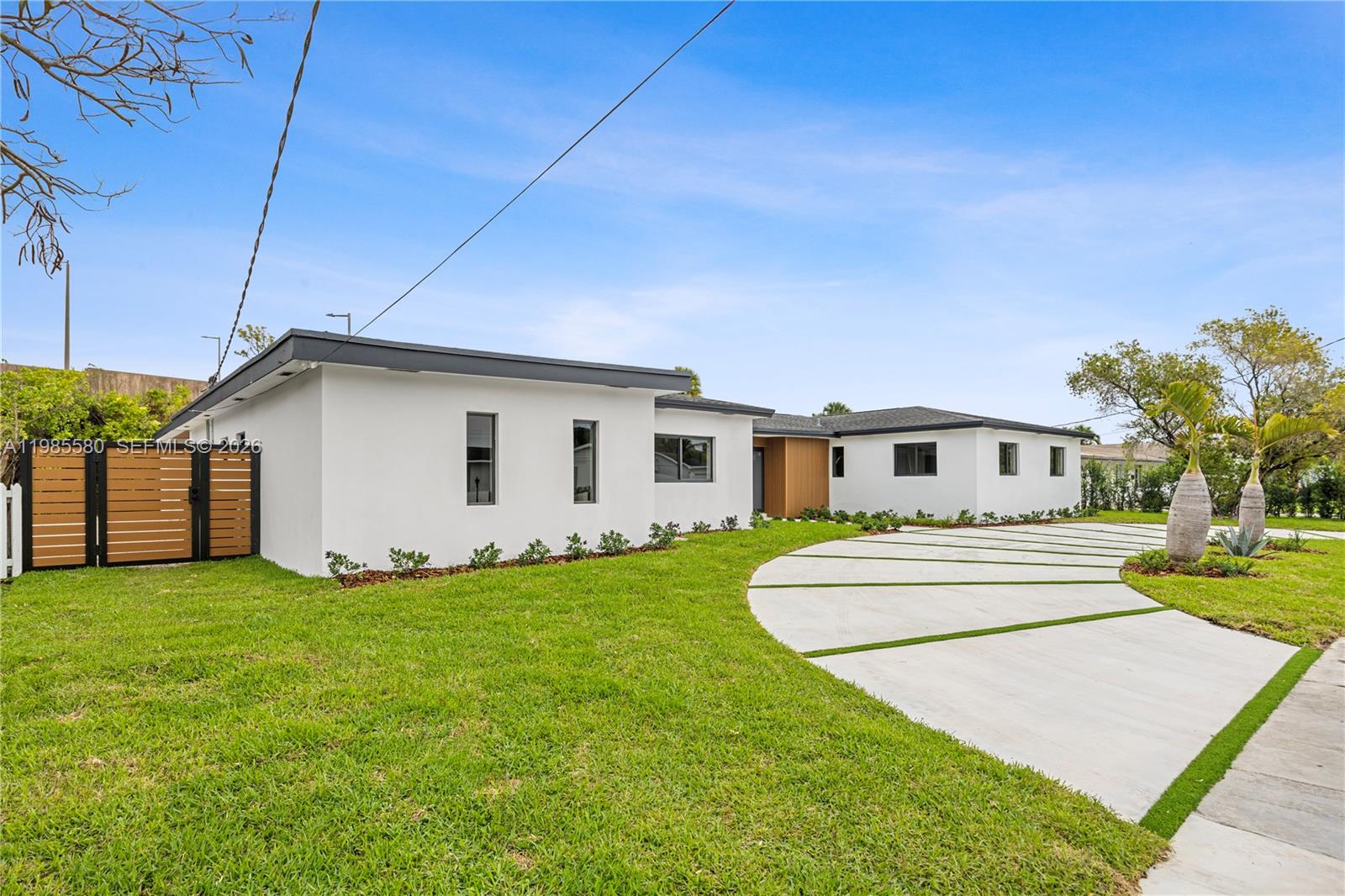 9261 Southwest 80th Terrace Miami, FL 33173 - Photo 4 of 58 a view of a house with a yard