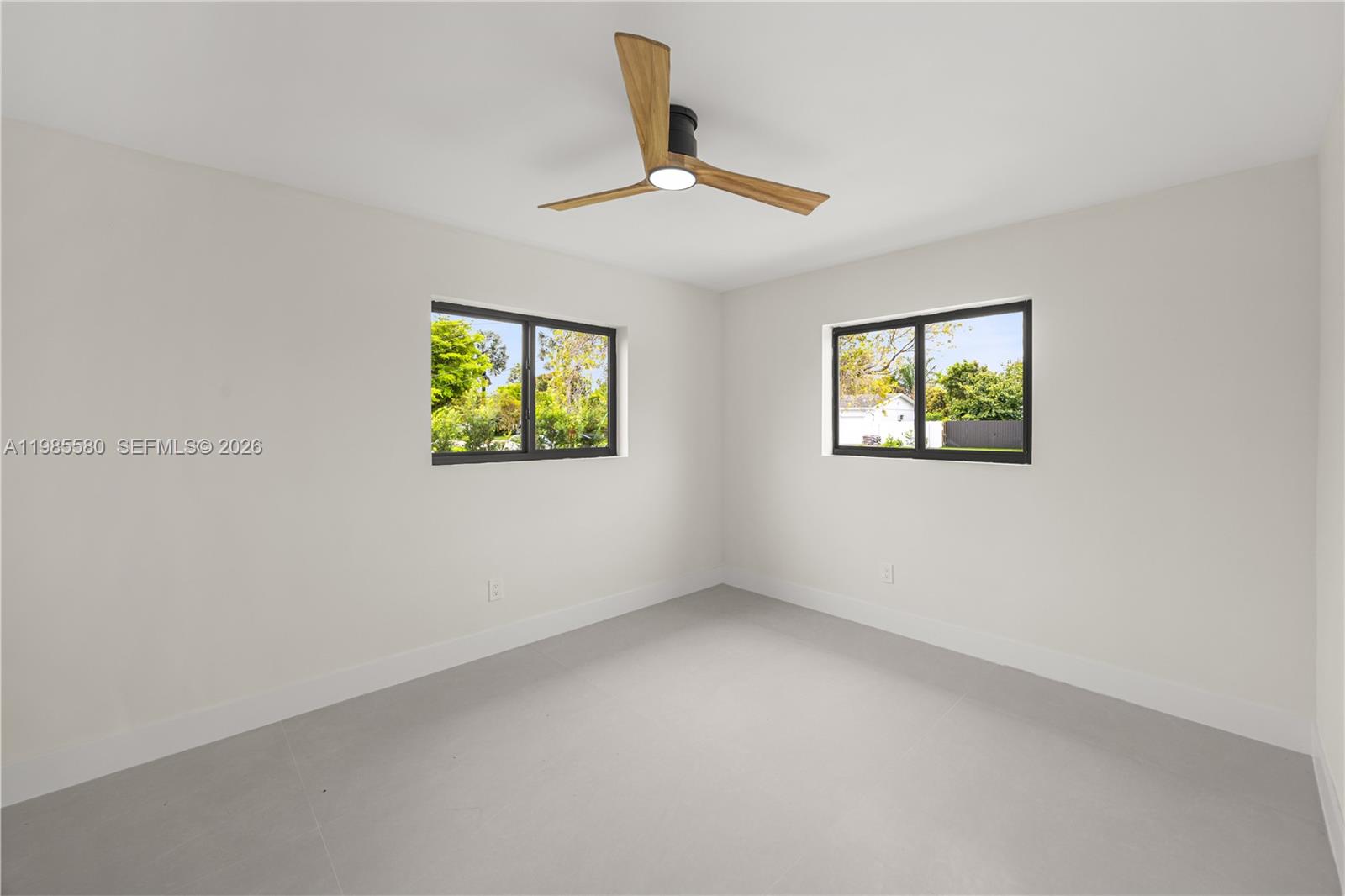 9261 Southwest 80th Terrace Miami, FL 33173 - Photo 48 of 58 a view of empty room with window