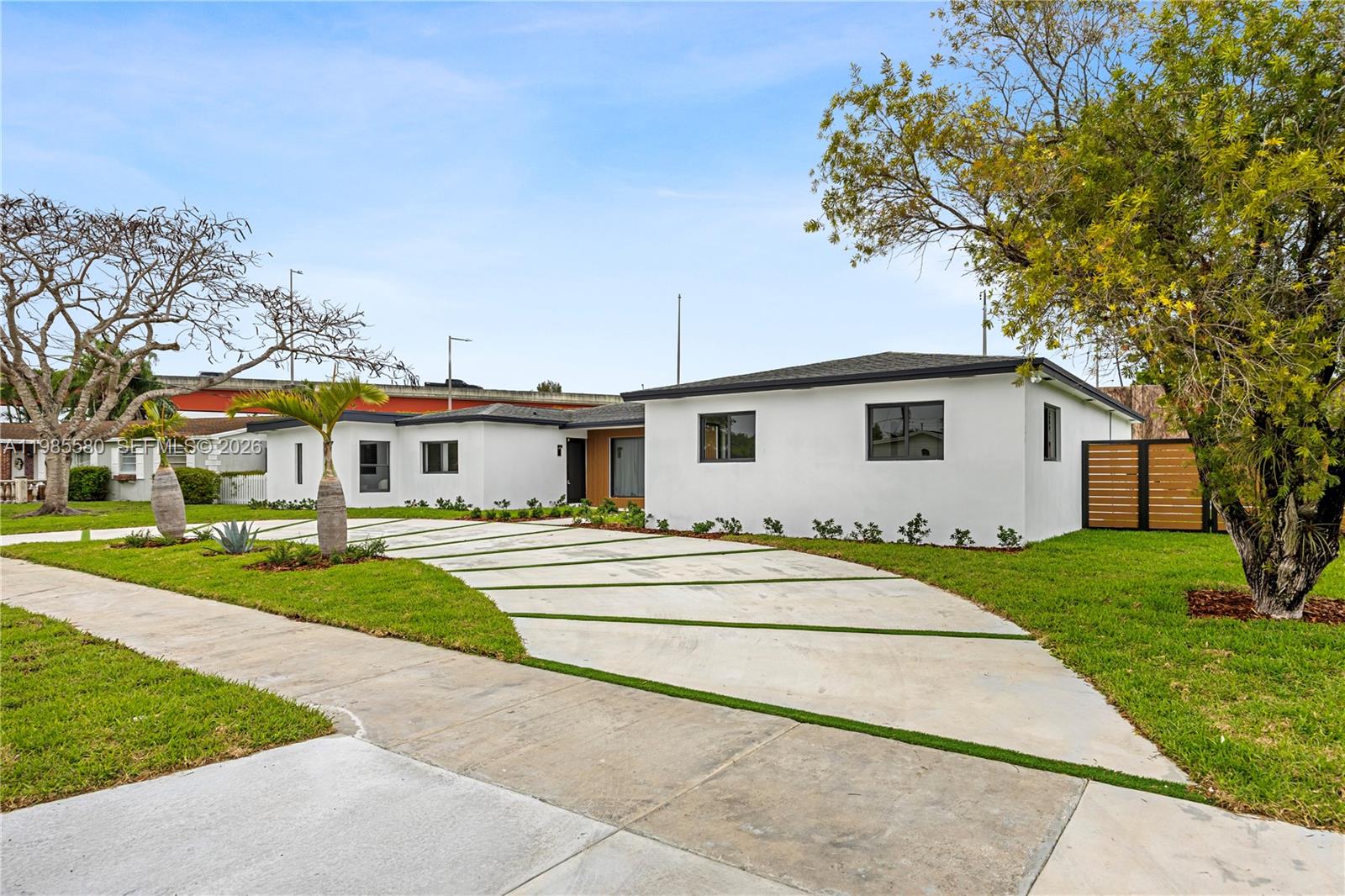 9261 Southwest 80th Terrace Miami, FL 33173 - Photo 5 of 58 a front view of house with yard and green space