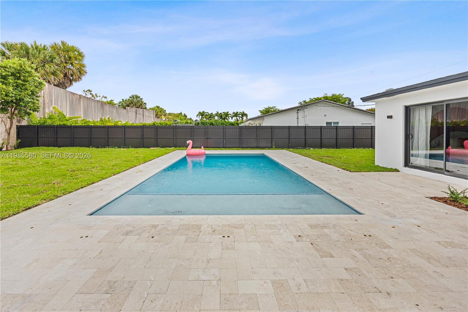 9261 Southwest 80th Terrace Miami, FL 33173 - Photo 55 of 58 a view of outdoor space yard and swimming pool