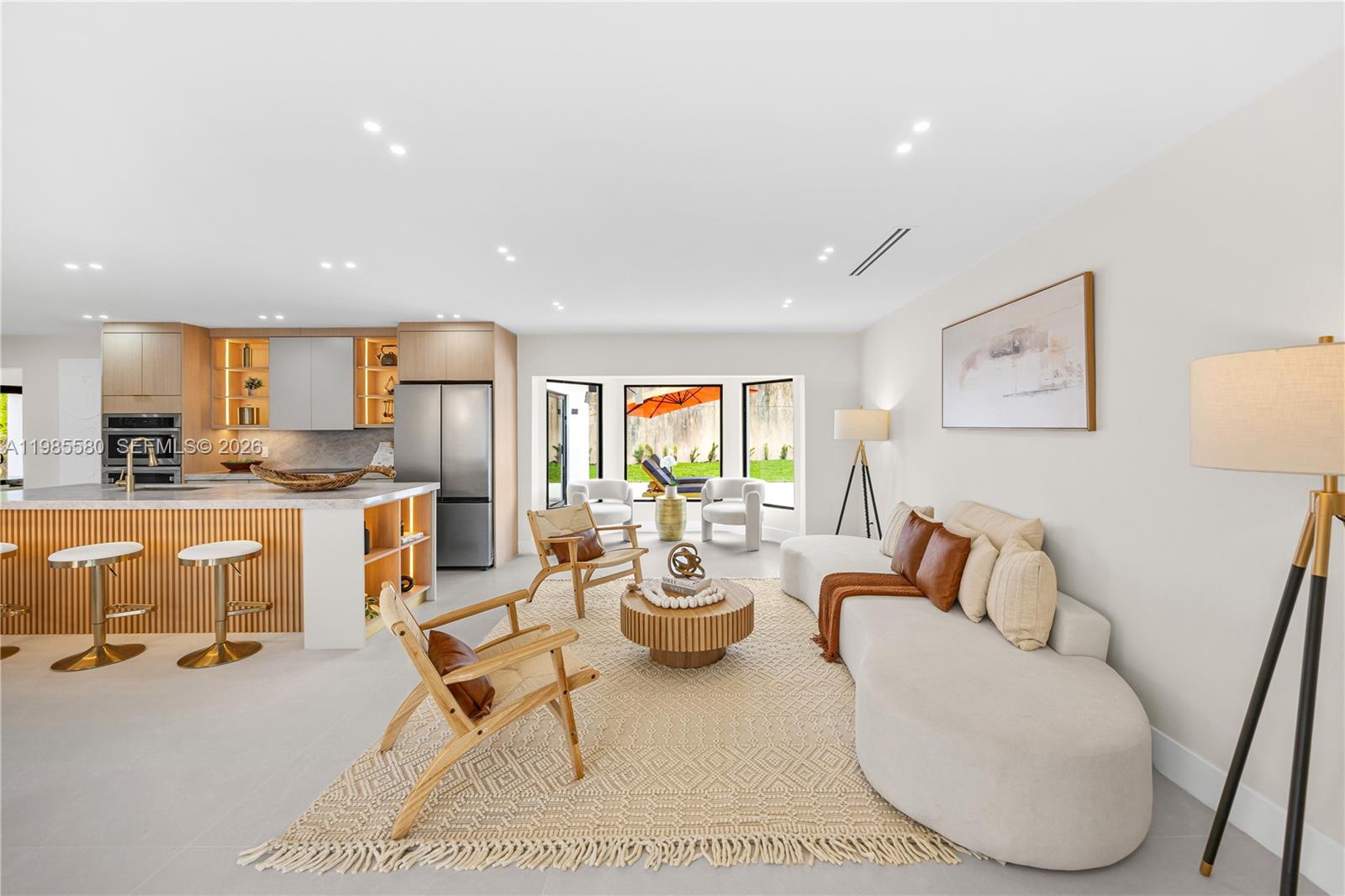 9261 Southwest 80th Terrace Miami, FL 33173 - Photo 6 of 58 a living room with furniture and a large window