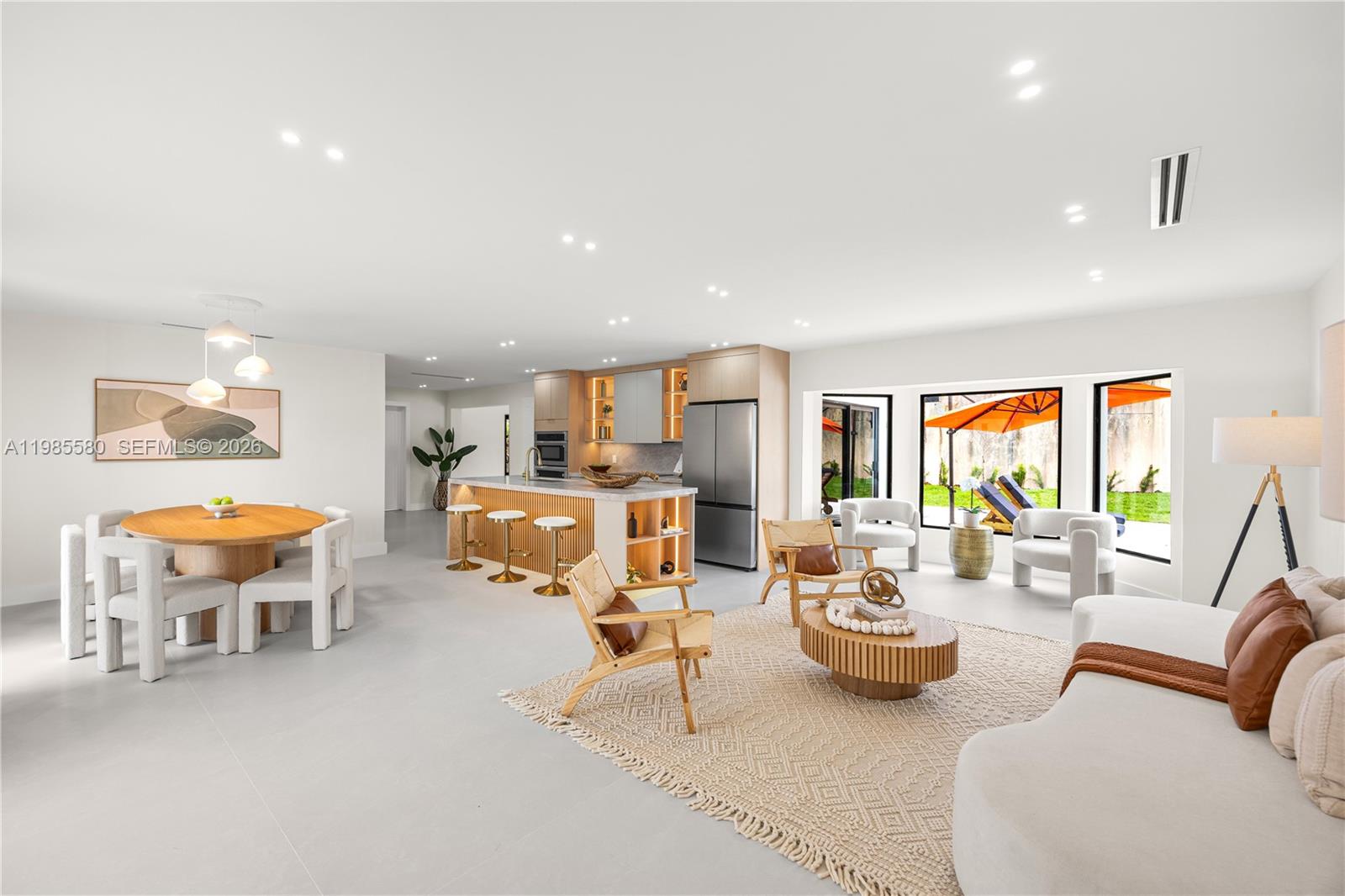 9261 Southwest 80th Terrace Miami, FL 33173 - Photo 7 of 58 a living room with furniture and a large window