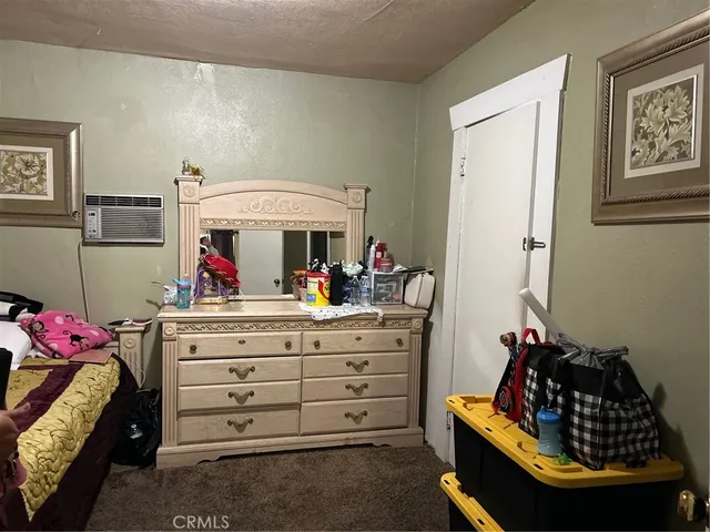 a room with furniture and a bed