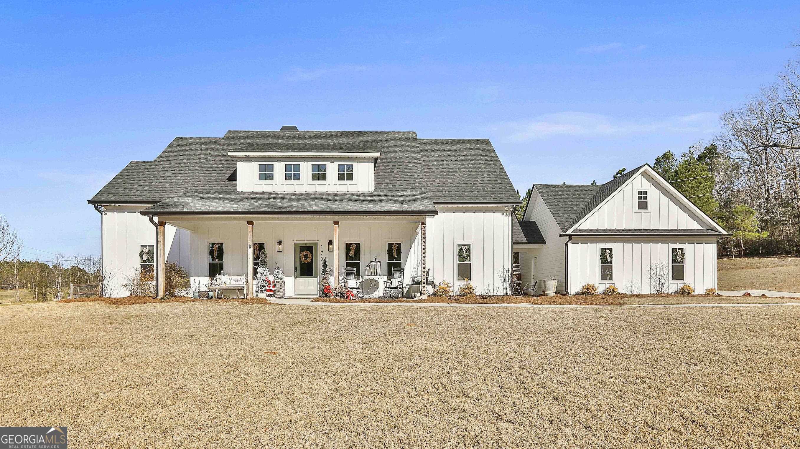 173 McKoy Road Newnan, GA 30263 - Photo 1 of 1 a front view of a house with a porch