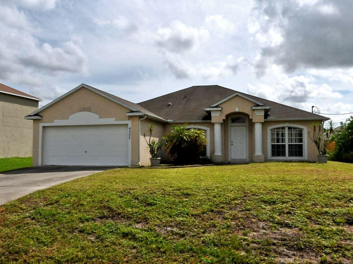 4255 Southwest Daemon Street Port St. Lucie, FL 34953 - Photo 1 of 13 FRONT
