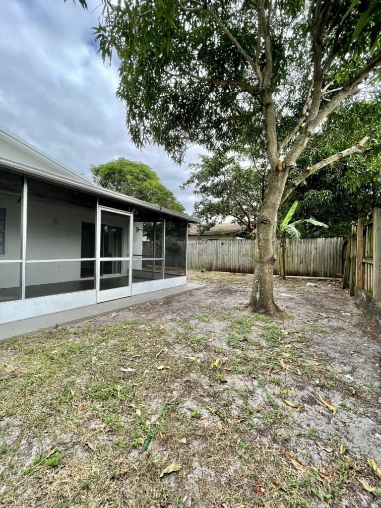 6140 Southwest 3rd Street Margate, FL 33068 - Photo 22 of 24 Outdoor Side Yard