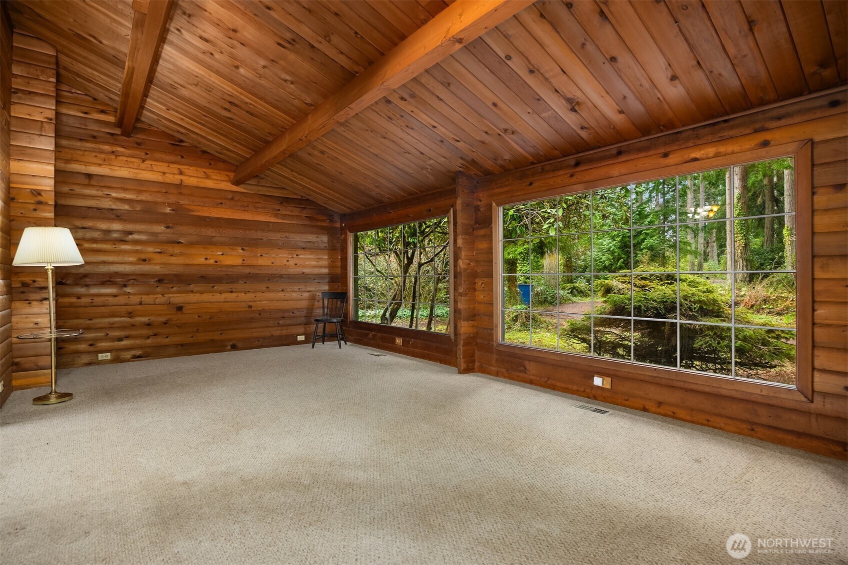 10862 Falk Road Northeast Bainbridge Island, WA 98110 - Photo 13 of 34 a view of a room with wooden walls and roof