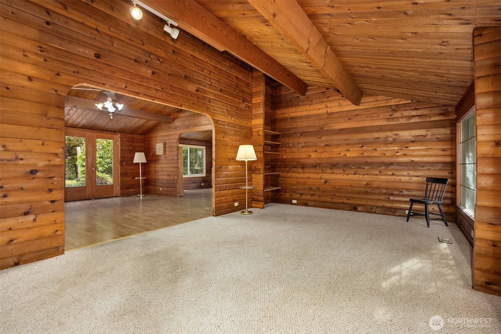 10862 Falk Road Northeast Bainbridge Island, WA 98110 - Photo 14 of 34 a view of an empty room with a fireplace