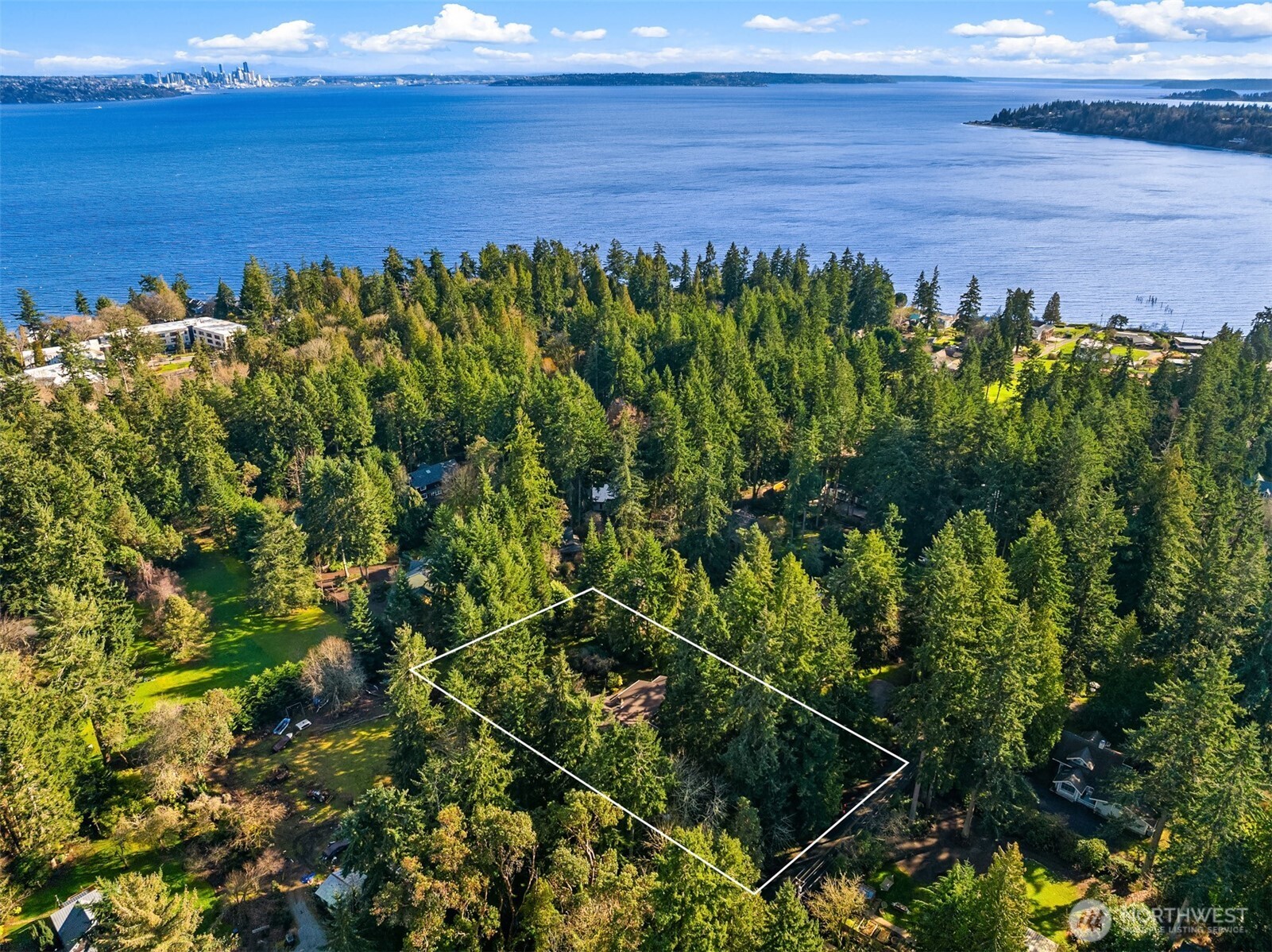 10862 Falk Road Northeast Bainbridge Island, WA 98110 - Photo 25 of 34 a view of a field with an ocean