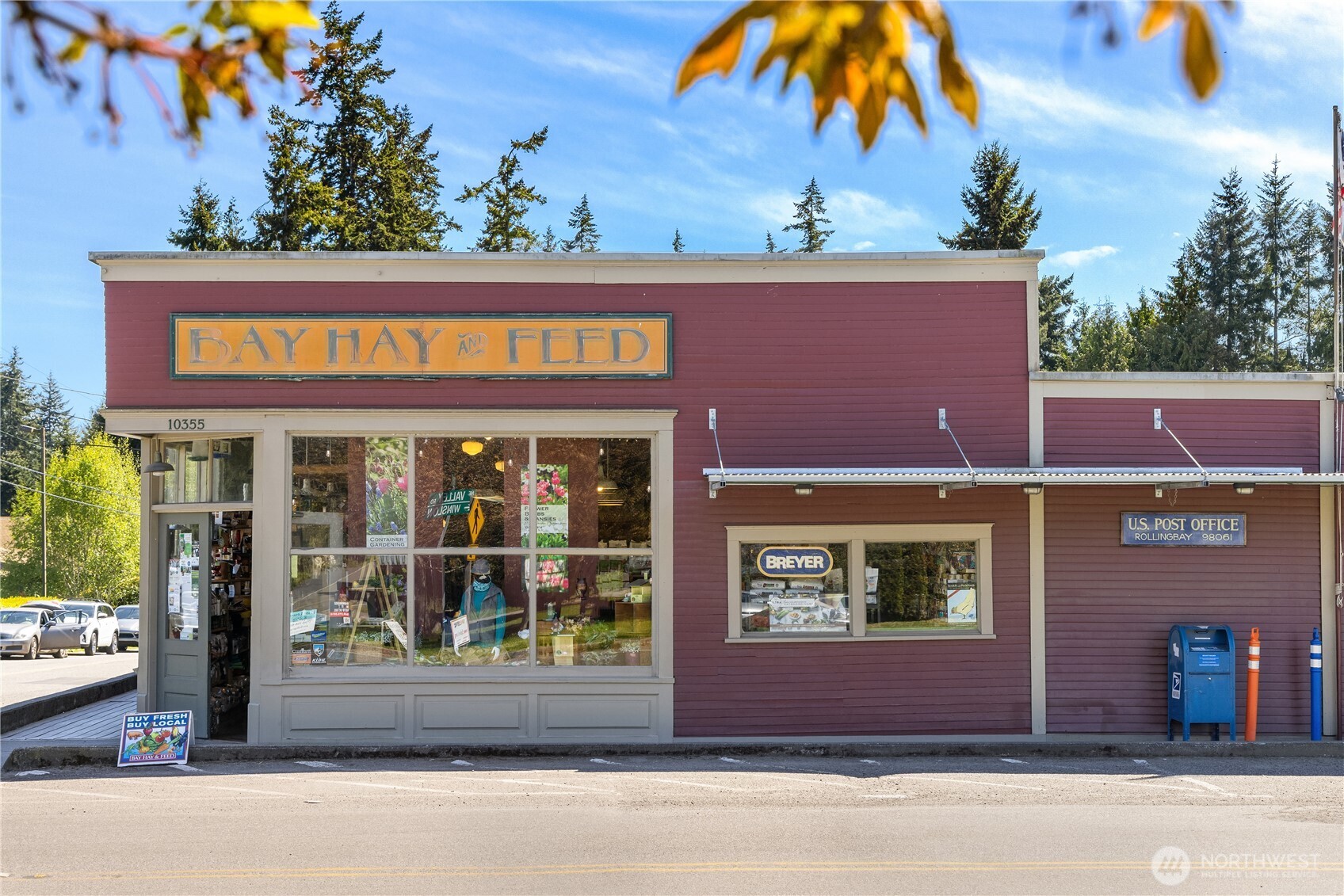 10862 Falk Road Northeast Bainbridge Island, WA 98110 - Photo 30 of 34 front view of a building with a tree