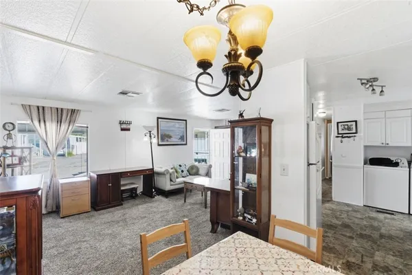 a view of living room and kitchen