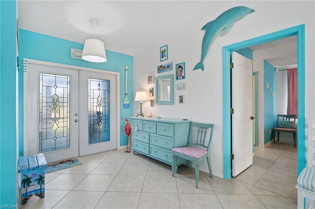 1408 Southwest 23rd Street Cape Coral, FL 33991 - Photo 12 of 49 a bathroom with a sink mirror and window