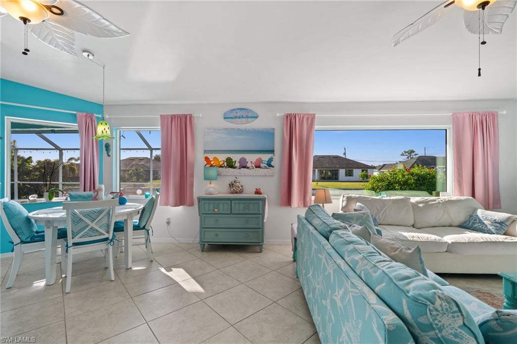 1408 Southwest 23rd Street Cape Coral, FL 33991 - Photo 19 of 49 a living room with furniture and a large window