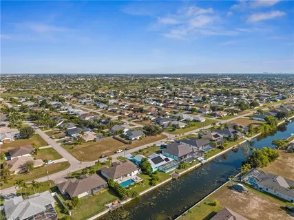 an aerial view of residential building and ocean