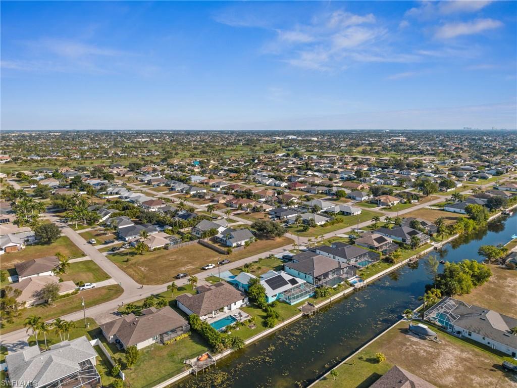 1408 Southwest 23rd Street Cape Coral, FL 33991 - Photo 29 of 49 an aerial view of residential building and ocean