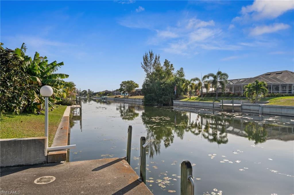 1408 Southwest 23rd Street Cape Coral, FL 33991 - Photo 48 of 49 a view of a lake from a yard