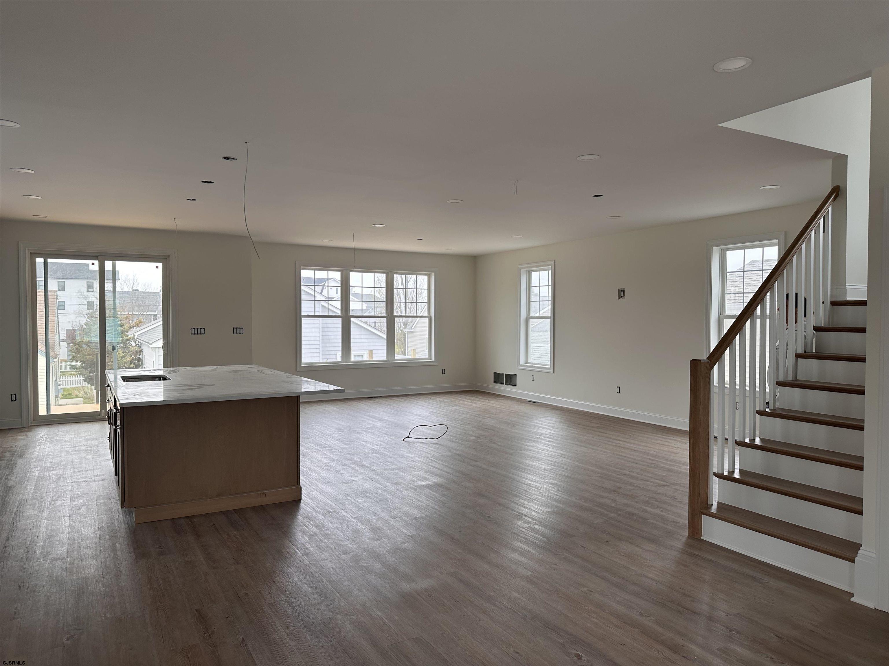 140 11th Street South Brigantine, NJ 08203 - Photo 4 of 7 a living room with hardwood floor and a window