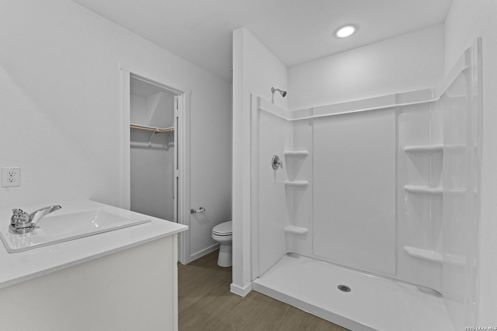 337 Kayden Court Marion, TX 78124 - Photo 22 of 25 a bathroom with a shower sink vanity and toilet