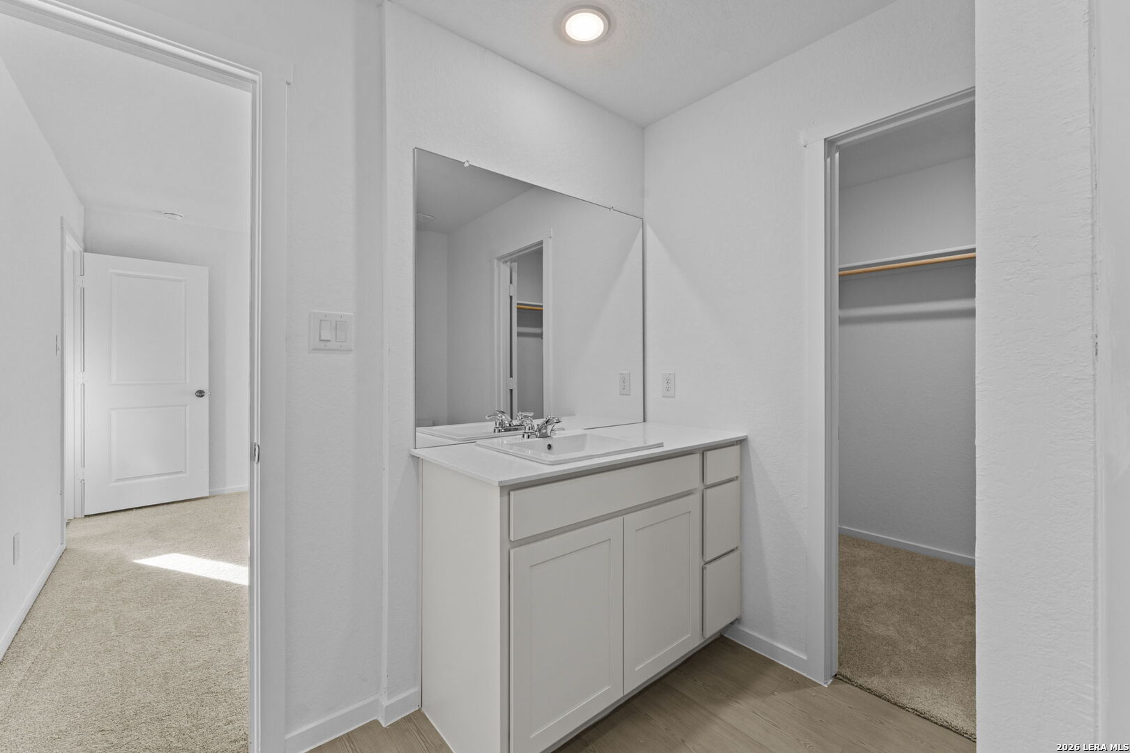 337 Kayden Court Marion, TX 78124 - Photo 23 of 25 a bathroom with a sink and a mirror