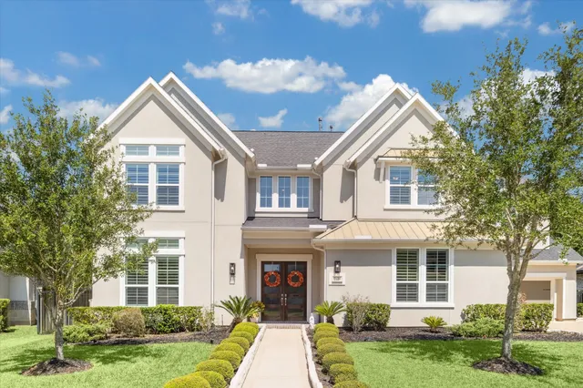 front view of a house and a yard