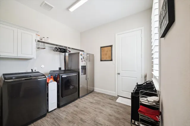 a storage room with washer and dryer