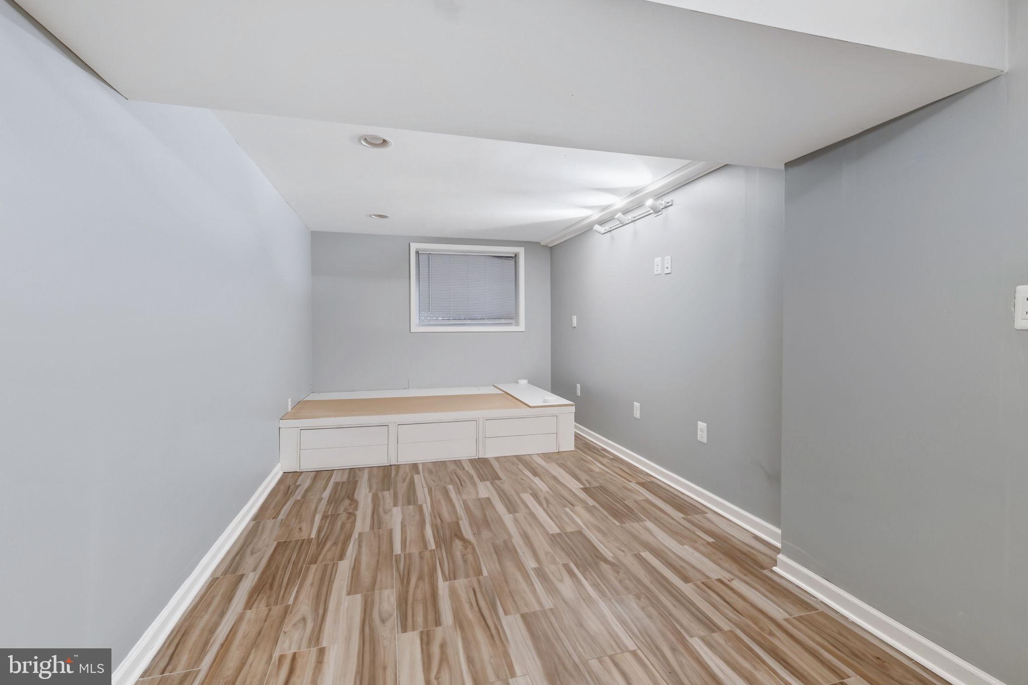 8817 Lagrange Street Lorton, VA 22079 - Photo 30 of 47 a view of a room with wooden floor and small space
