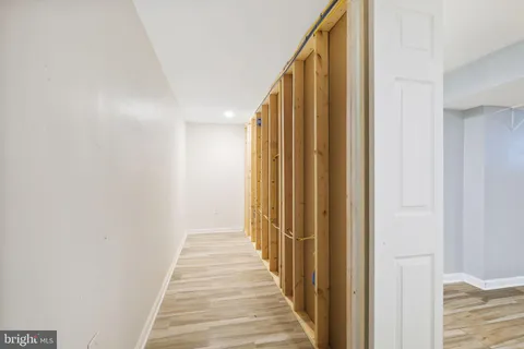 a view of a hallway with stairs