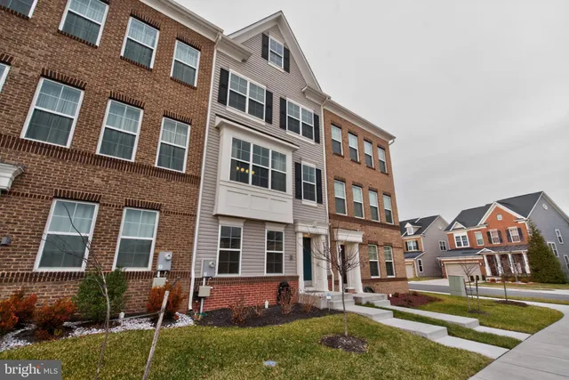 a view of an apartment with furniture and fire pit