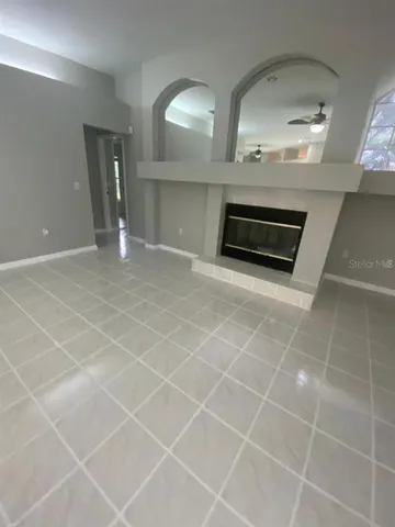 a stove top oven sitting inside of a kitchen