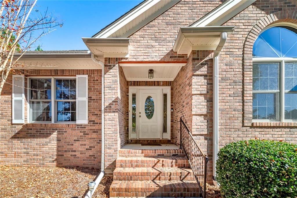 151 Courts Of Hampton Hampton, GA 30228 - Photo 11 of 54 a front view of a house with windows