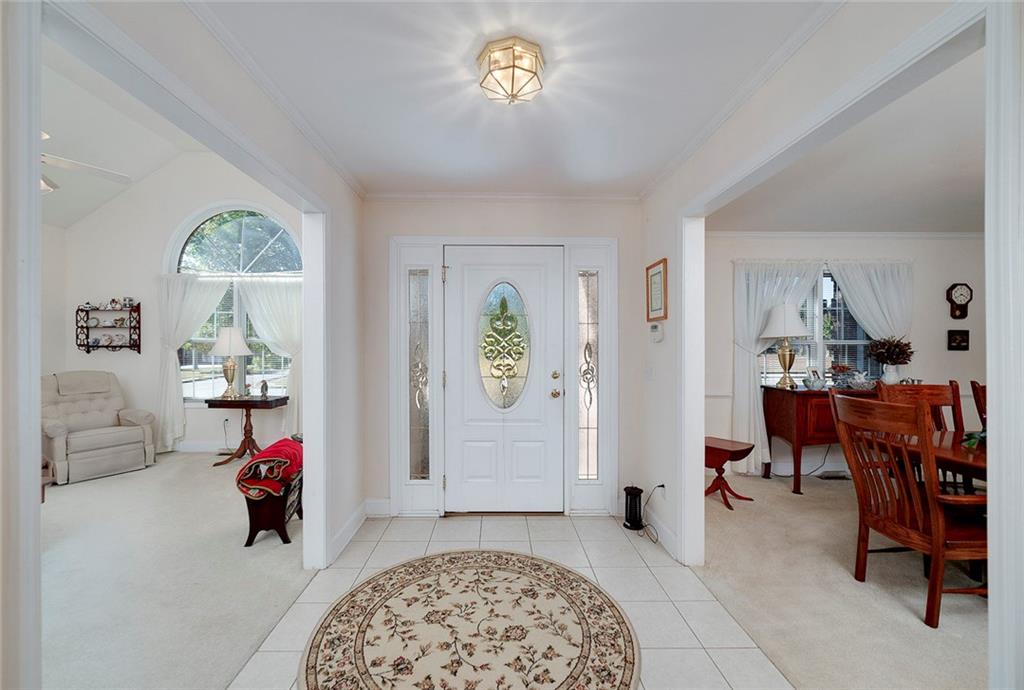 151 Courts Of Hampton Hampton, GA 30228 - Photo 12 of 54 a living room with furniture and a window