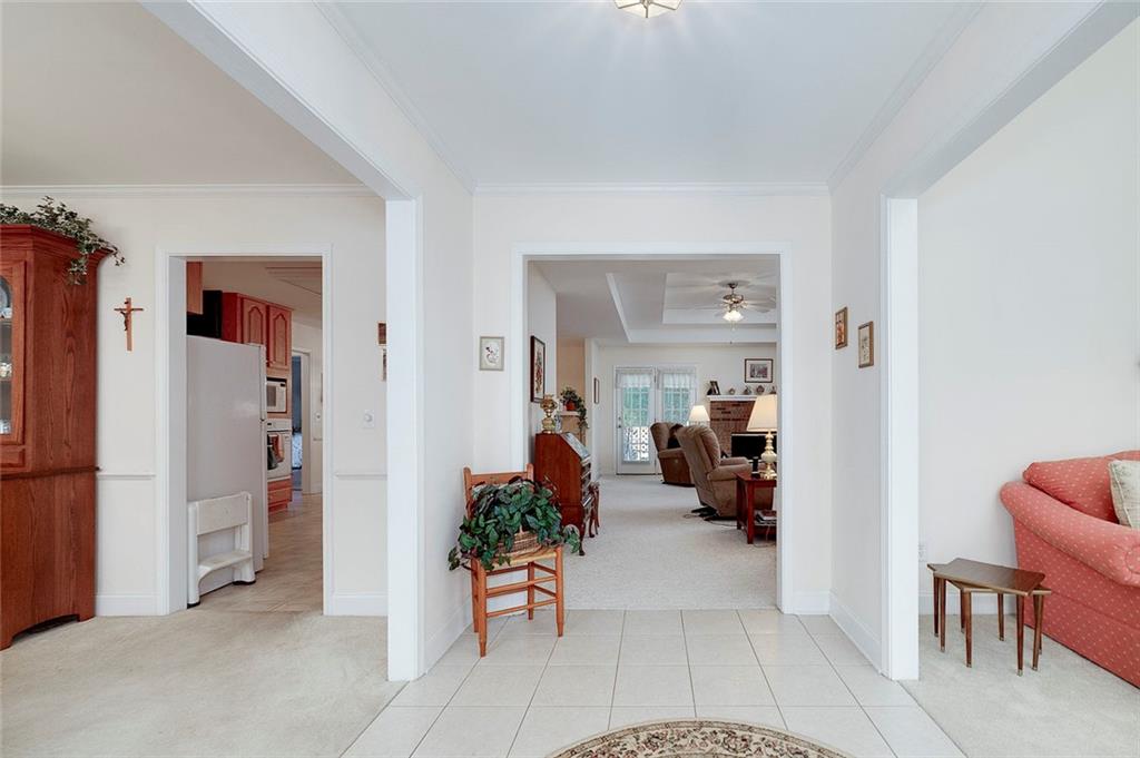151 Courts Of Hampton Hampton, GA 30228 - Photo 13 of 54 a view of a livingroom with furniture and an empty room