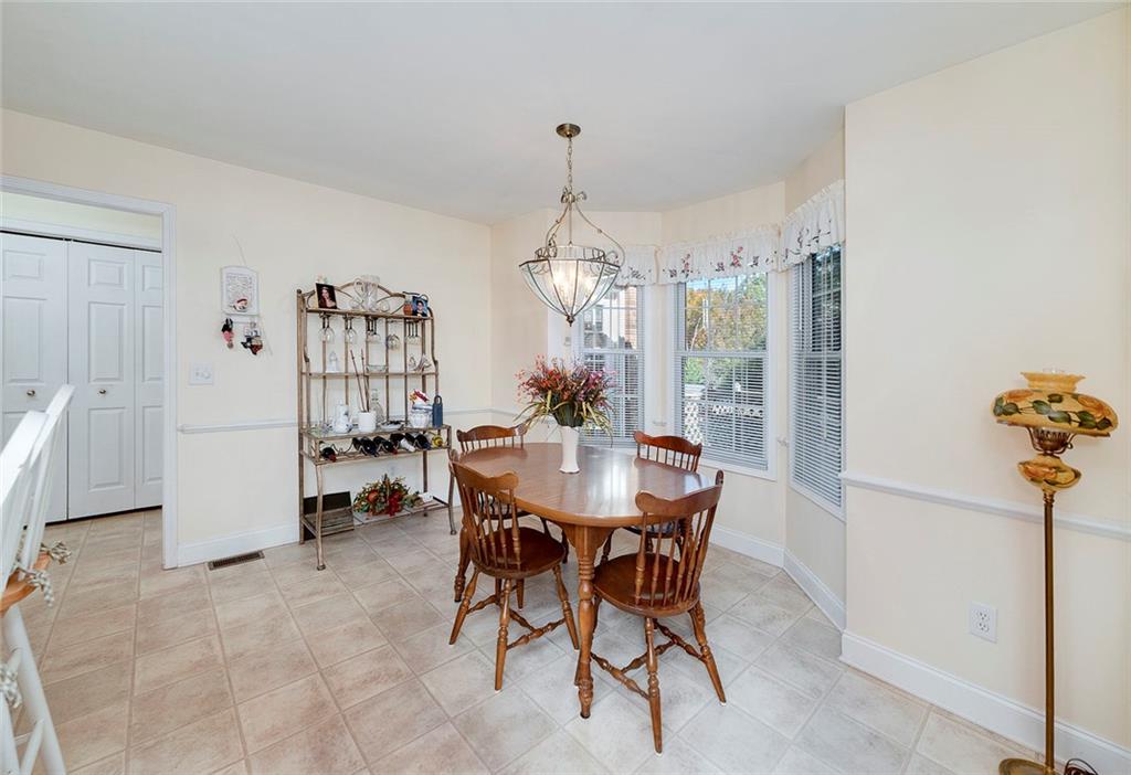 151 Courts Of Hampton Hampton, GA 30228 - Photo 22 of 54 a view of a dining room with furniture and window