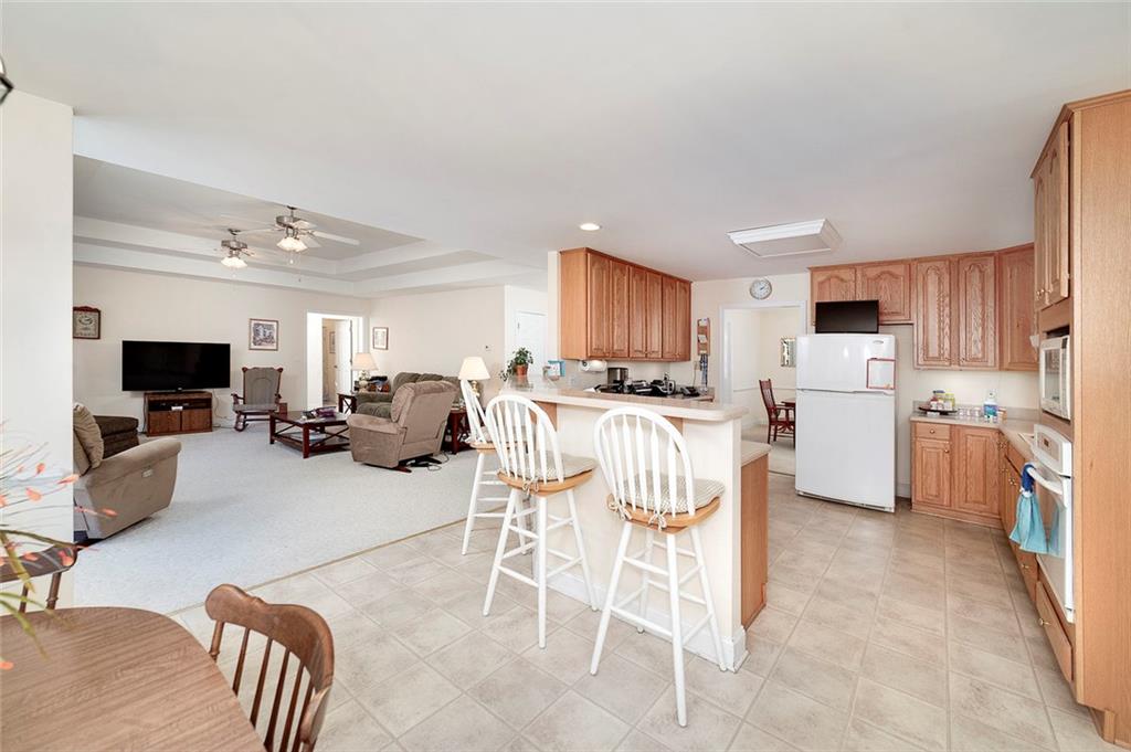 151 Courts Of Hampton Hampton, GA 30228 - Photo 23 of 54 a living room with furniture a flat screen tv and a window