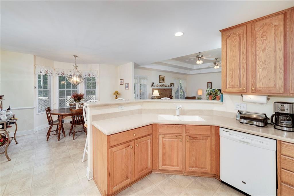 151 Courts Of Hampton Hampton, GA 30228 - Photo 26 of 54 a kitchen with a sink and cabinets