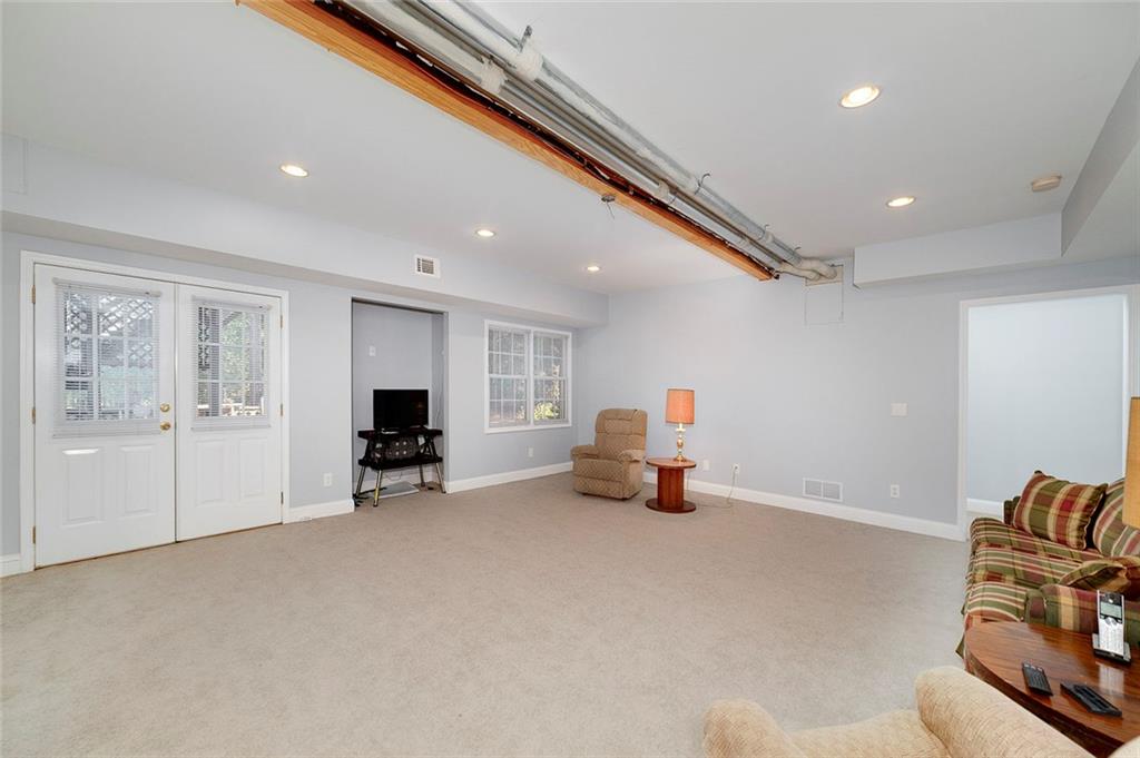 151 Courts Of Hampton Hampton, GA 30228 - Photo 39 of 54 a view of a livingroom with furniture and a window