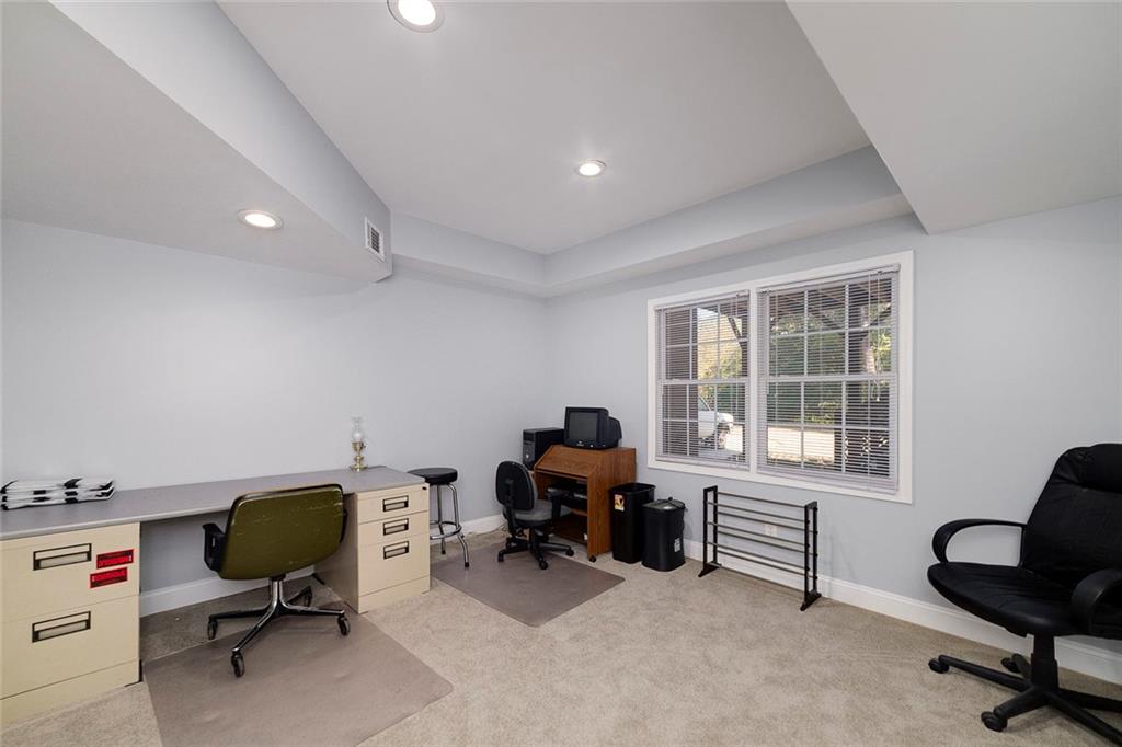 151 Courts Of Hampton Hampton, GA 30228 - Photo 41 of 54 a view of a workspace with furniture and a window