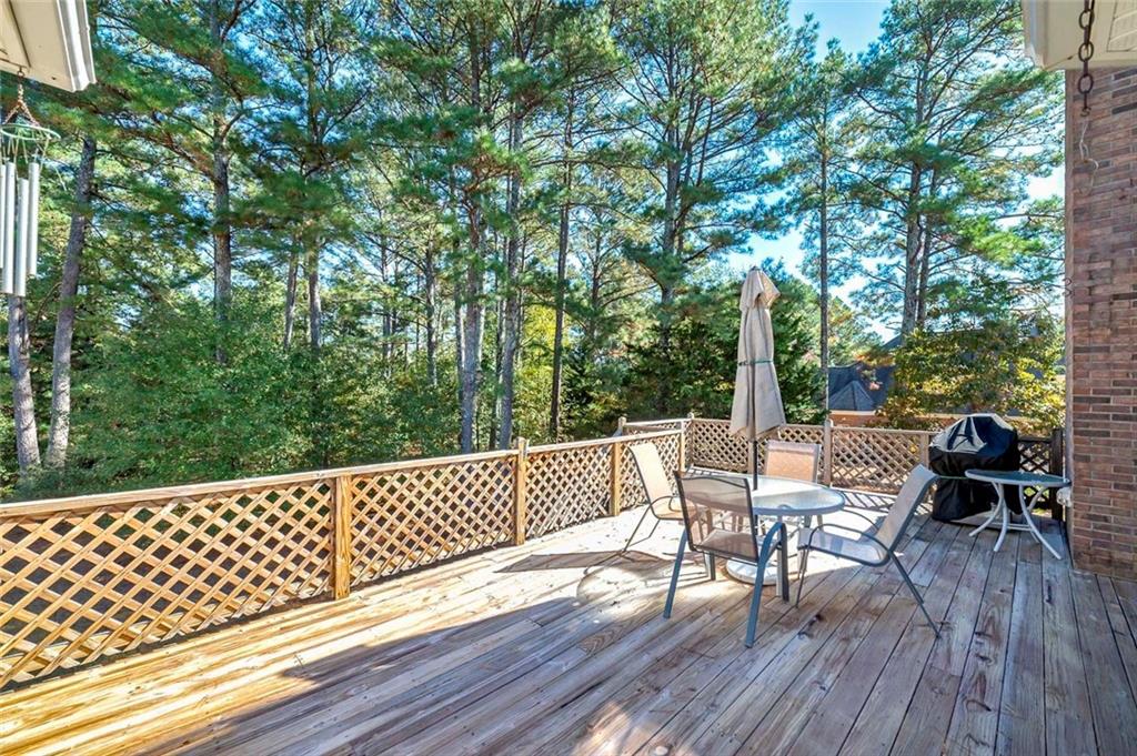 151 Courts Of Hampton Hampton, GA 30228 - Photo 6 of 54 a view of a chair and table on the deck