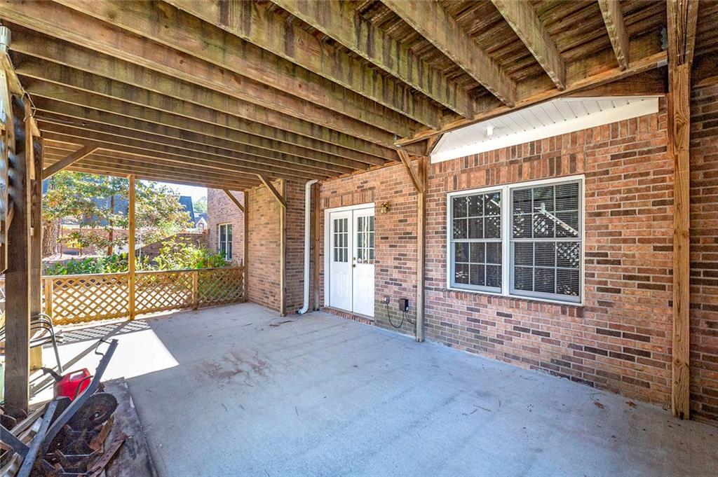 151 Courts Of Hampton Hampton, GA 30228 - Photo 8 of 54 a view of a room with wooden floor and iron walls