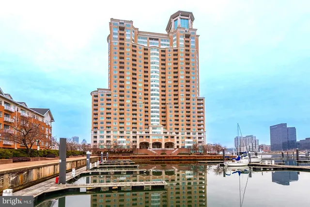 a view of a lobby with furniture and floor to ceiling window