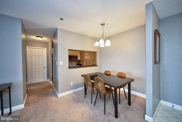 a very nice looking living room with a large window